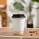 10oz white double wall paper cup in use