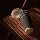 16oz black ripple cup in use