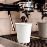 8oz white single wall paper cup in use