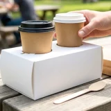 recyclable white paper holder for 2 paper cups in use